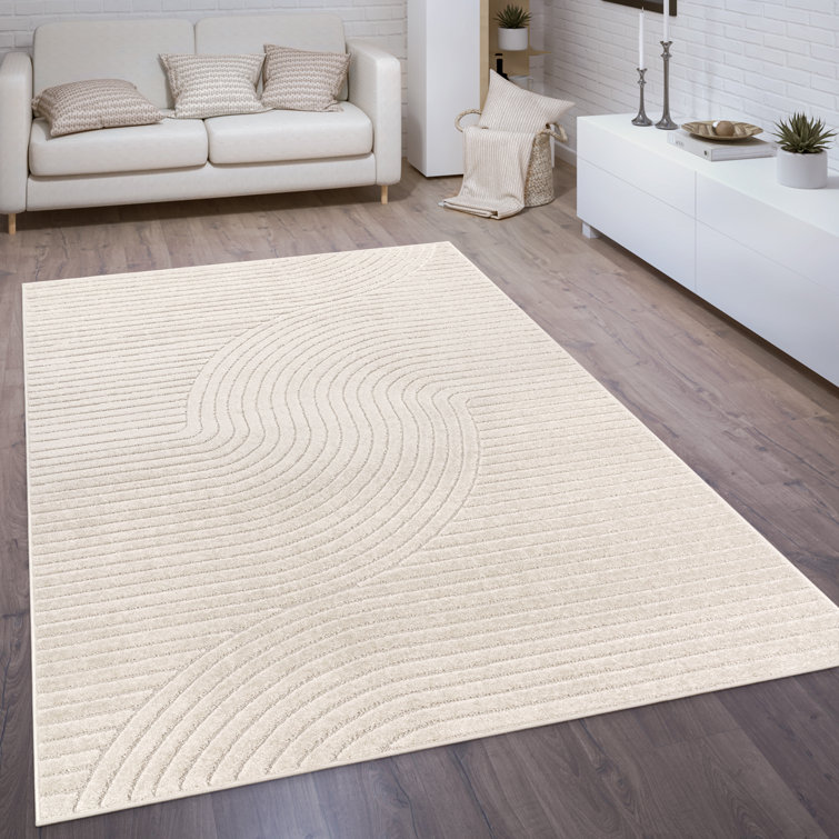 17 Stories Lyndzey Solid Colour Machine Woven Beige/Cream Area Rug